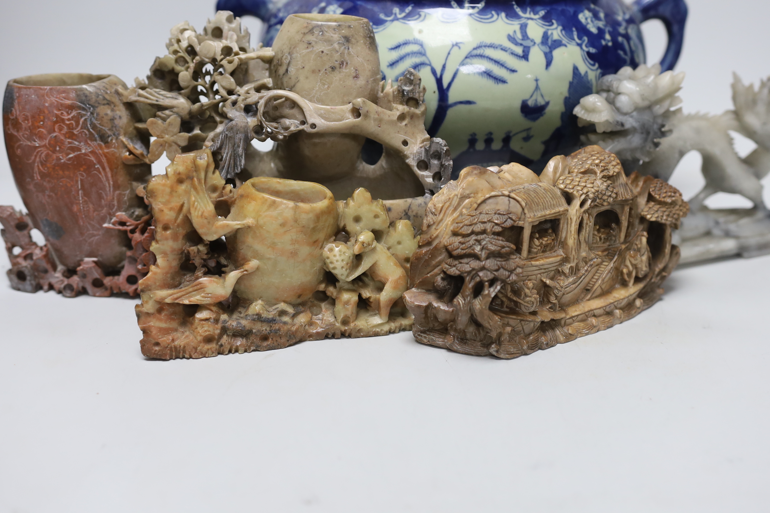 Five Chinese soapstone carvings and a two handled pot
